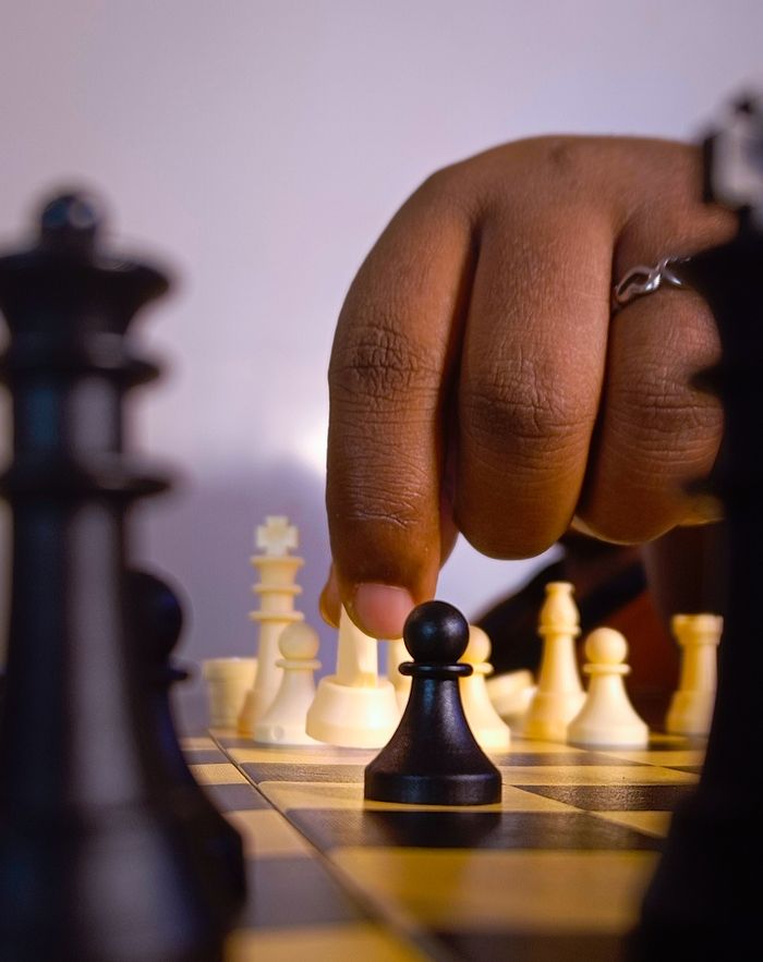 A strategic move in a chess game with focus on a black pawn in play.